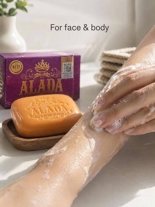 Alada 100% Natural Radiance Soap bar showing a white, rectangular soap with packaging and natural ingredients background