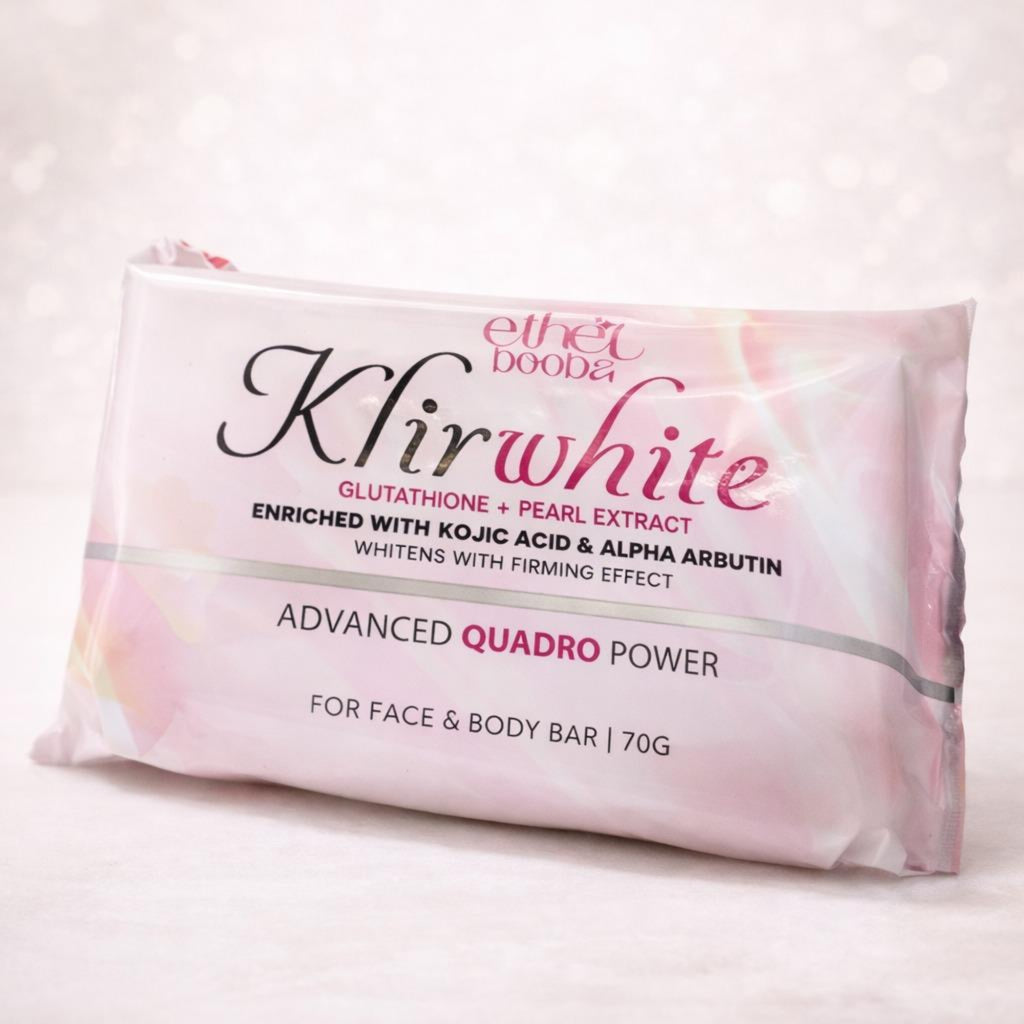 A 70g bar of Ethel Boodea Khirwhite Advanced Quadro Power face and body soap, shown in its pink and white packaging against a soft, light bokeh background.