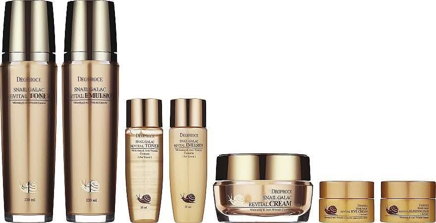 Set of skincare products with gold and brown packaging on a white background