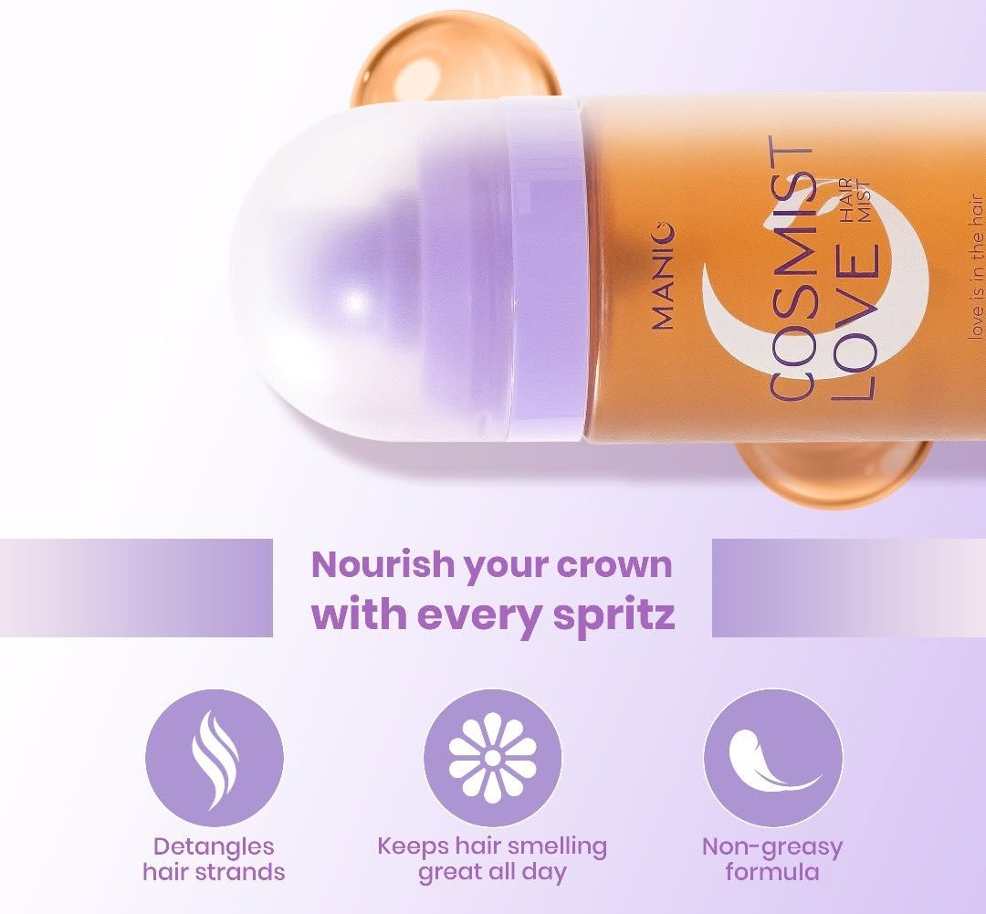 A cosmetic hair product bottle labeled MANIC COSMIST LOVE Hair Care, shown diagonally with a translucent cap and orange-tinted liquid droplets. Below, purple text reads 'Nourish your crown with every spritz' and three icons describe benefits: detangling hair strands, keeping hair smelling great all day, and non-greasy formula.