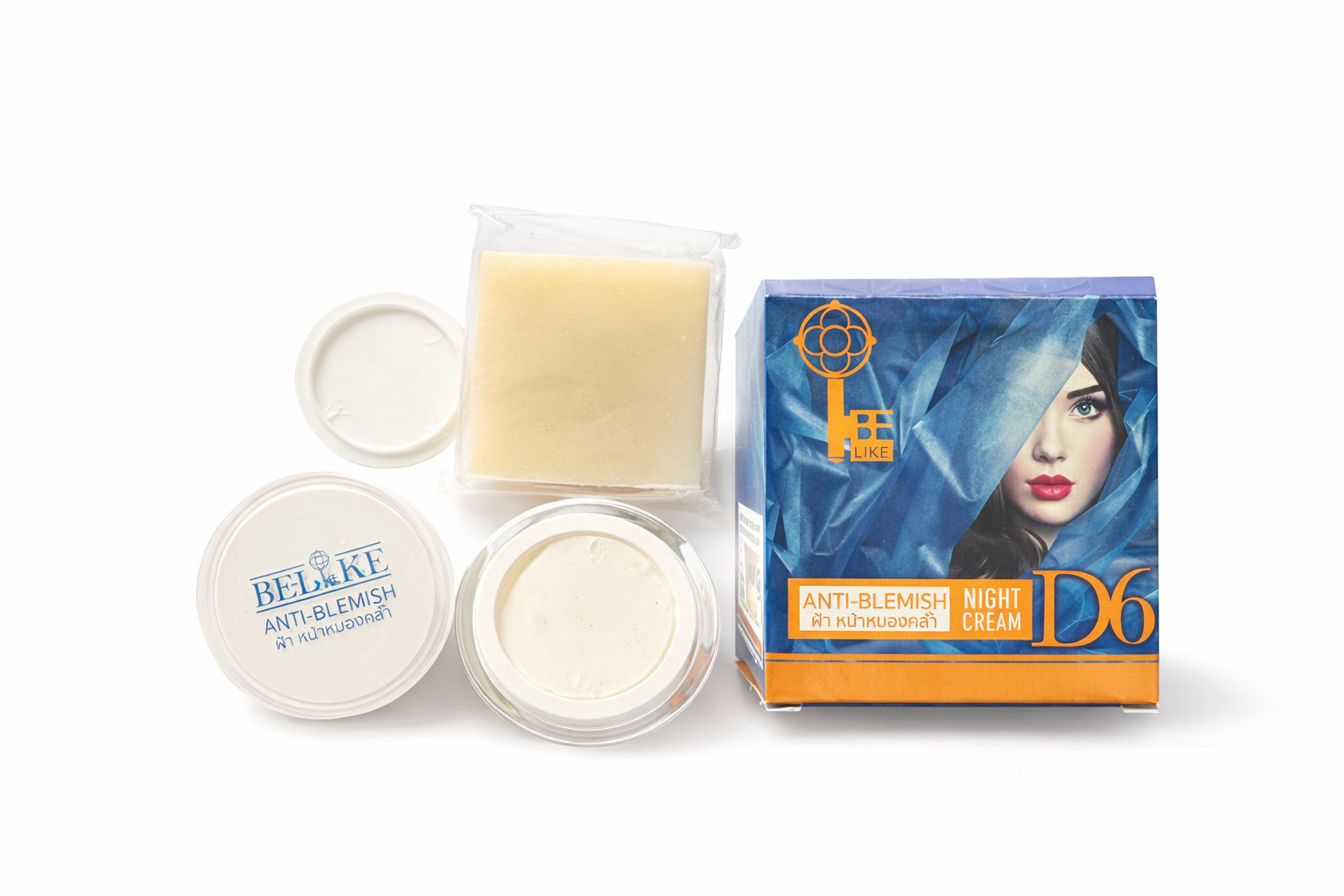 Cosmetic products including a box, jar, and container on a white background