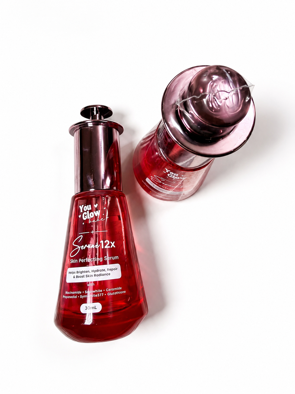 A 20ml bottle of You Glow Skin 12x Sea Perforating Serum in a translucent deep red bottle with a metallic dark cap, shown alongside a second bottle lying on its side on a white background.