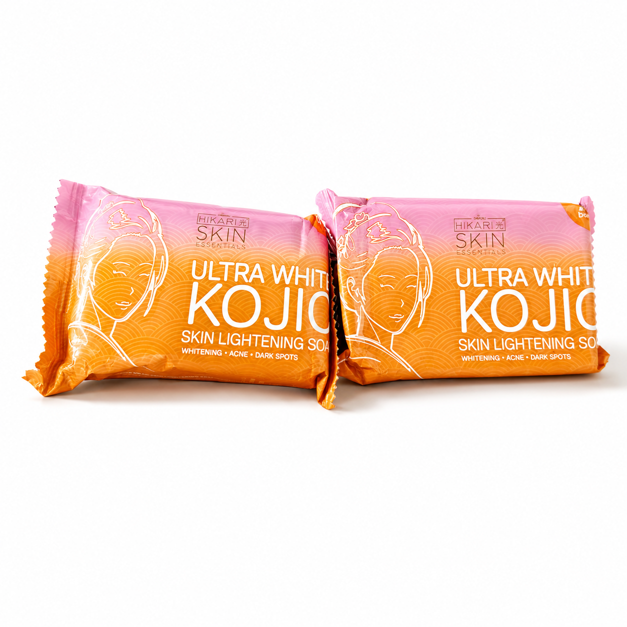 Two bars of Ultra White Kojic skin lightening soap with pink and orange packaging on a white background.