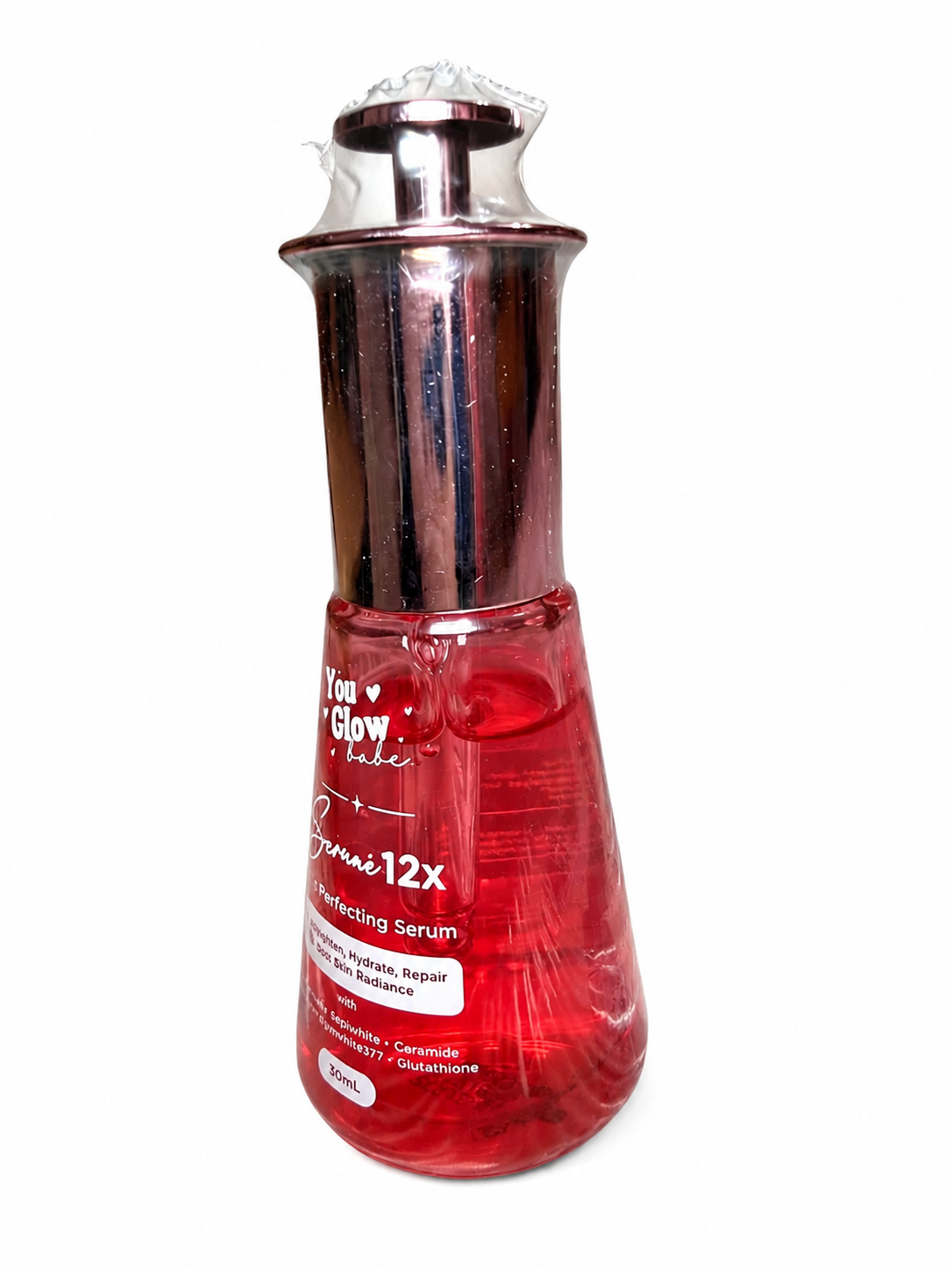 A bottle of You Glow Tale Face Prime 12X Perfecting Serum with a metallic silver cap and a red translucent bottle, shown on a white background.