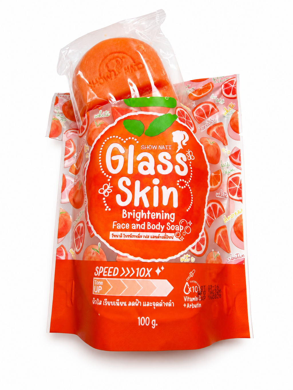 A 100g package of Show Natt Glass Skin Brightening Face and Body Soap, shaped like an orange with a clear plastic wrapper and a bright orange label.