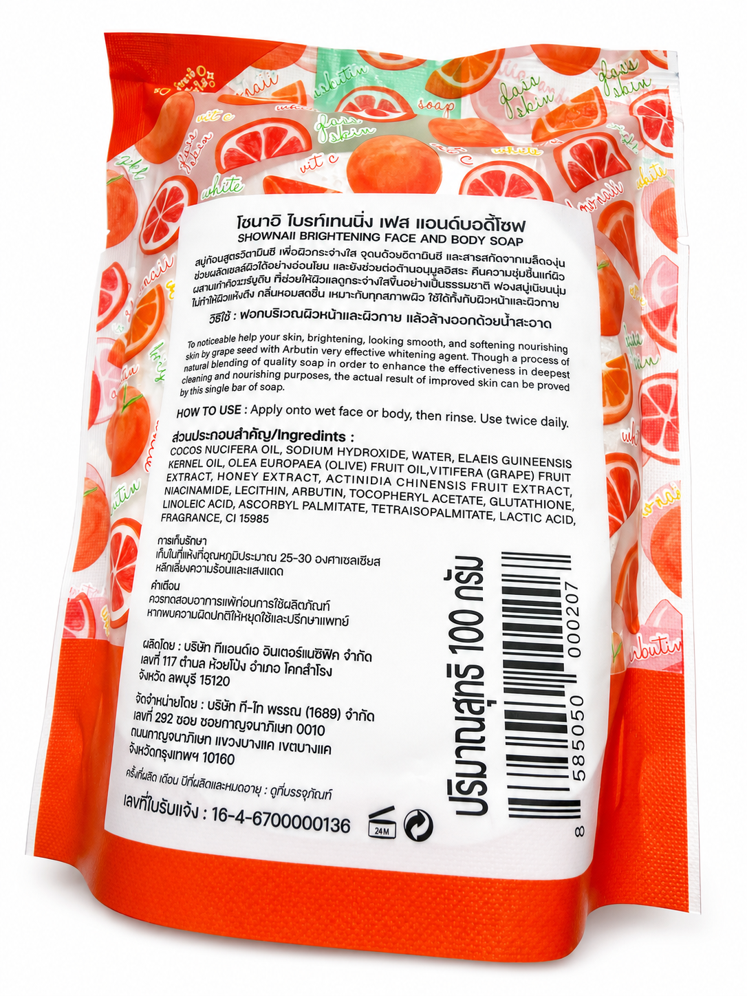 The back of a red and white packaged face and body soap pouch with Thai text, citrus illustrations, a barcode, and ingredient information.