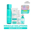 Luxe Organix Miracle Solutions beauty bundle with products and holographic pouch on a white background
