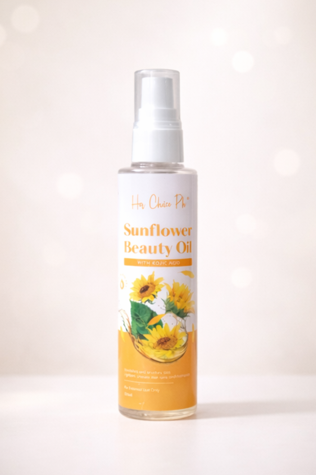 Sunflower beauty oil bottle with sunflower design on label against a white background