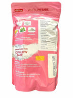 Pink packaging of 'You Glow Babe' with nutritional information on a white background