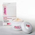 Amira Skin Radiance Cream 15g with a smooth, light-colored cream texture for day and night glow, against a clean background.