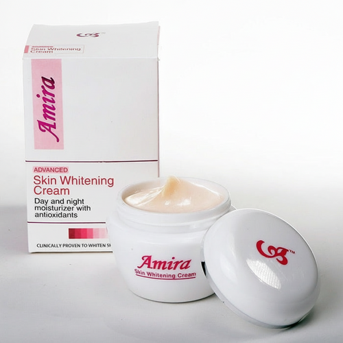 Amira Skin Radiance Cream 15g with a smooth, light-colored cream texture for day and night glow, against a clean background.