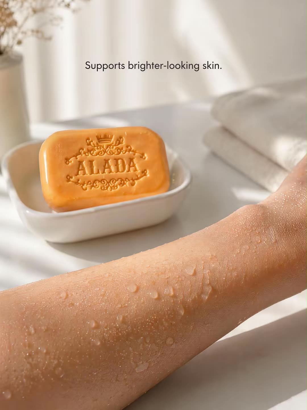 Alada 100% Natural Radiance Soap bar with a smooth, white surface, designed to enhance skin glow and natural beauty.